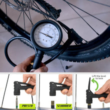 Dial inflator on a mountain bike tire; its head fits Presta and Schrader valves and locks when the lever is lifted