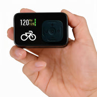 CycloSpirit mini electric bike pump held in one hand, its screen showing 120 psi