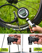 Digital inflator reading the pressure of a bike tire; its head fits Presta and Schrader valves